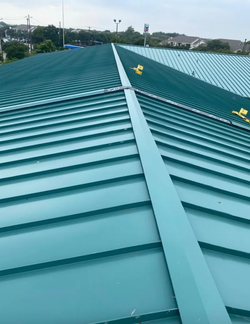Green commercial metal roof ridge and valley for Metal Roof Repair in Des Moines